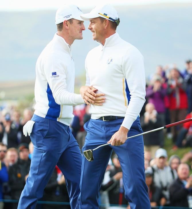 Justin Rose and Henrik Stenson of Europe