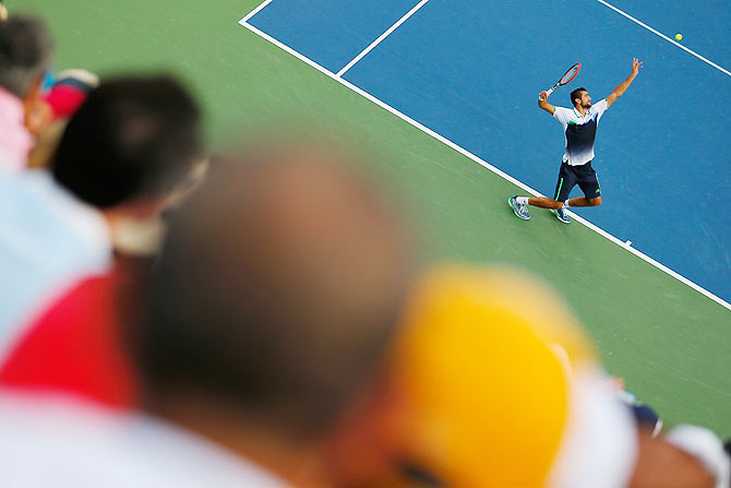 Marin Cilic prepares to serve