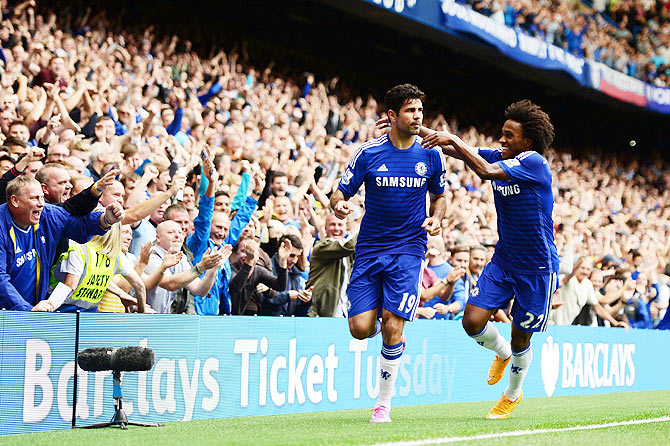 Diego Costa of Chelsea celebrates after scoring his team's second goal during the Barclays Premier League match