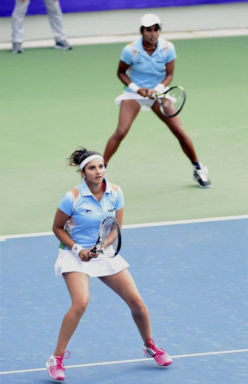 Sania Mirza and Prarthana Thombare in action during the Asian Games doubles match