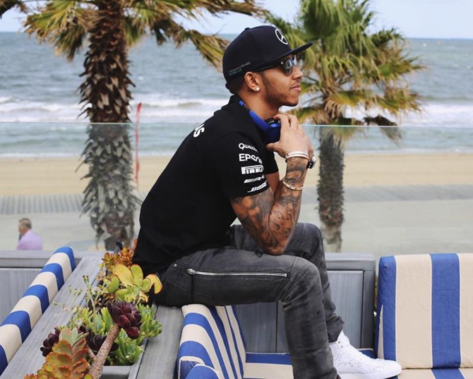 Decoding F1 star Lewis Hamilton's tattoos - Rediff.com Sports