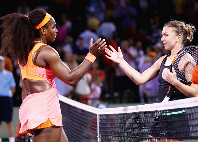 Serena Williams of the United States shakes hands at the net after her three set victory against Simona Halep