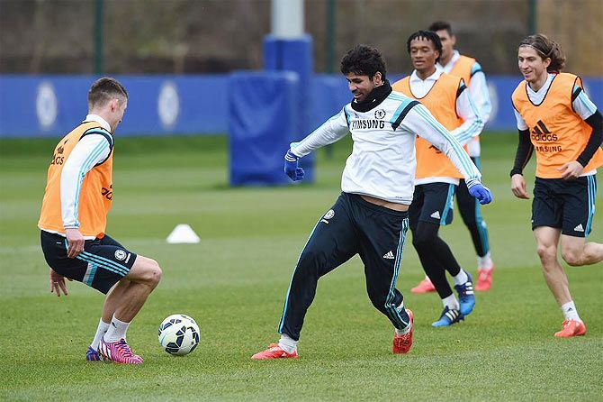 Diego Costa goes through the grind during a Chelsea training session on Friday