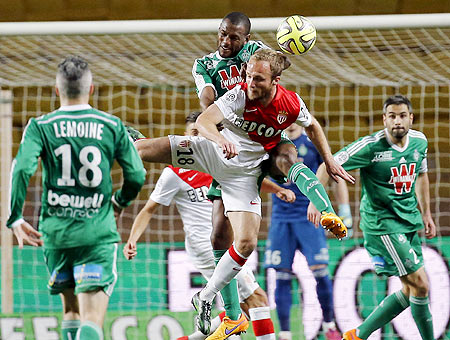 Monaco's Valere Germain (centre) challenges Saint Etienne's Kevin Theophile (top centre) during their Ligue 1 soccer match at Louis II stadium in Monaco on Friday