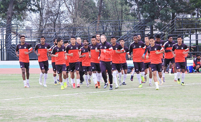 The Indian football team go through the grind during a training session