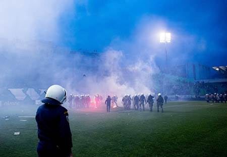 Police clash with Panathinaikos hooligans ahead of the Super League match between Panathinaikos FC and Olympiacos at Apostolos Nikolaidis Stadium in Athens in February