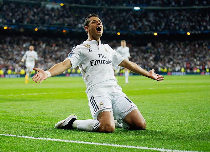 Javier Hernandez of Real Madrid celebrates as he scores against Atletico during their UEFA Champions League quarter-final second leg match at the Bernabeu on Wednesday