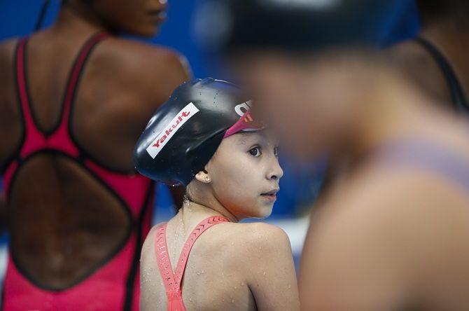 10-year-old Bahraini Alzain Tareq looks on after finishing last in her event. Tareq became the youngest ever competitor to race at the World Swimming Championships when she swam in the heats of the women's 50-metre butterfly on August 7