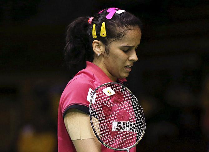 Saina shocked by World No 212 Zhiyi in first round