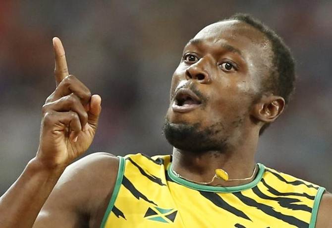 Usain Bolt celebrates after winning the 200 metres at the World Athletics Championships in Beijing on Thursday.