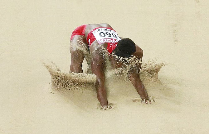 The USA's Tianna Bartoletta competes in the women's long jump final on Friday