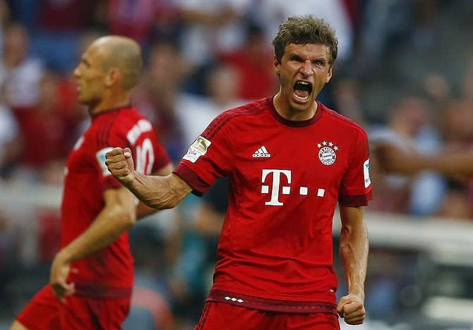 Munich's Thomas Mueller celebrates his goal against Bayer Leverkusen during their German first division Bundesliga match in Munich on Saturday