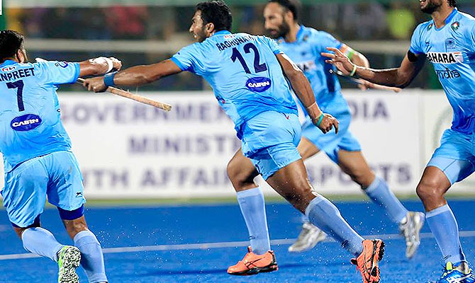 India's VR Raghunath celebrates scoring the first goal against England in their Hockey World League last eight match in Raipur 