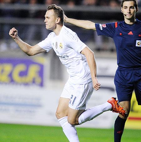 Real Madrid's Denis Cheryshev celebrates after scoring his team's opening goal against Cadiz during their Copa Del Rey King's Cup match at Ramon de Carranza stadium in Cadiz on Wednesday