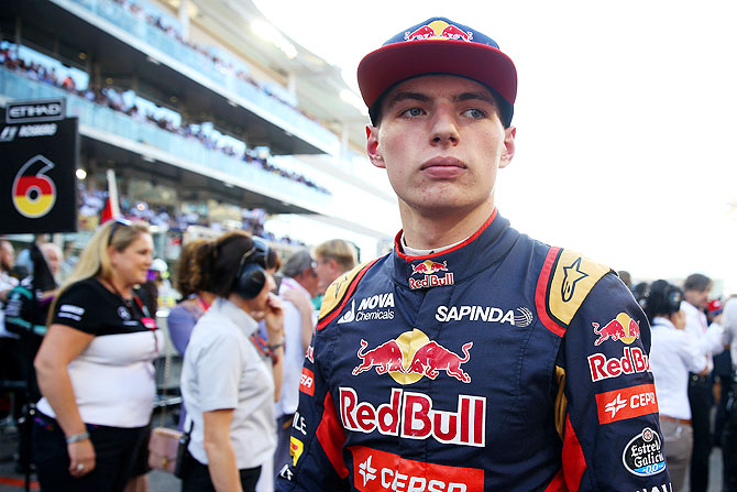 Max Verstappen of Scuderia Toro Rosso walks on the grid before the Abu Dhabi Formula One Grand Prix