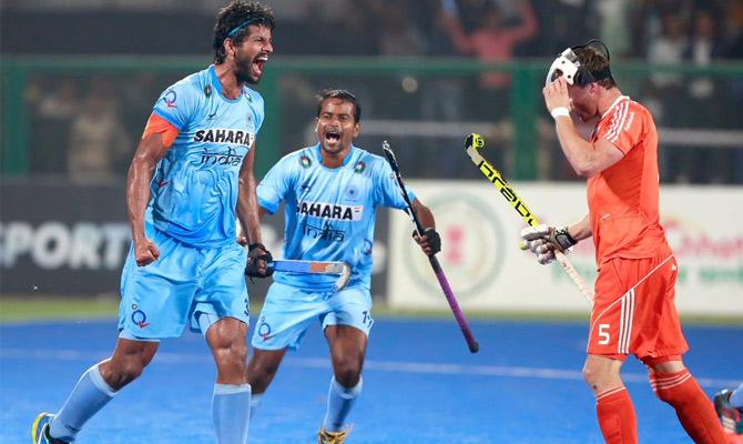 India's Rupinder Pal Singh celebrates scoring the winning goal against the Netherlands during the bronze medal match of the Hockey World League Final in Raipur 