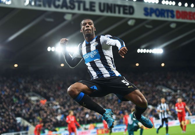 Newcastle United's Georginio Wijnaldum celebrates as he scores the second goal against Liverpool during their Barclays Premier League match at St James' Park in Newcastle upon Tyne, on Sunday