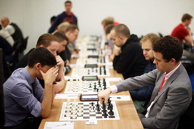Competitors play in the opening games at the London Chess Classic tournament in London on December 4. As well as a British knockout championship, the tournament will see nine super-grandmasters compete in the final leg of the Grand Chess Tour