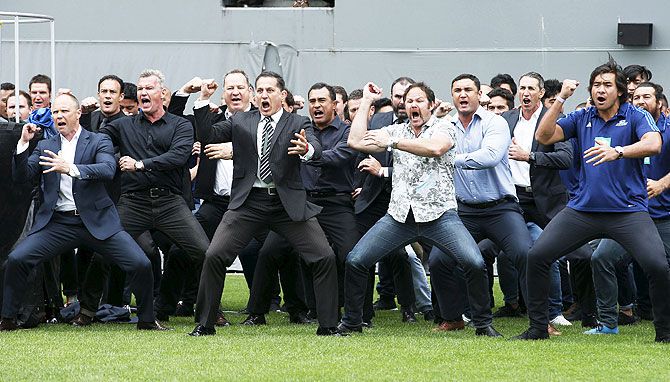 Former and present All Blacks players perform a Haka as former All Blacks player Jonah Lomu's casket is carried out of Eden Park during his memorial service in Auckland, New Zealand, on November 30