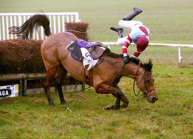 Loch Ard ridden by Miss S Gould falls at the last at Barbury Racecourse in Barbury, England, on December 6