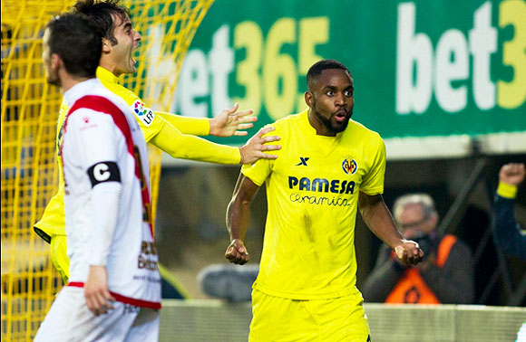 Villareal's Cedric Bakambu (right) celebrates after scoring against Rayo Vallecano during their La Liga match on Sunday