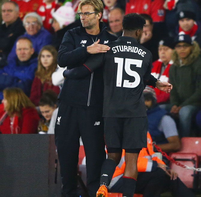 Liverpool's Daniel Sturridge shakes hands with Jurgen Klopp manager as he is substituted