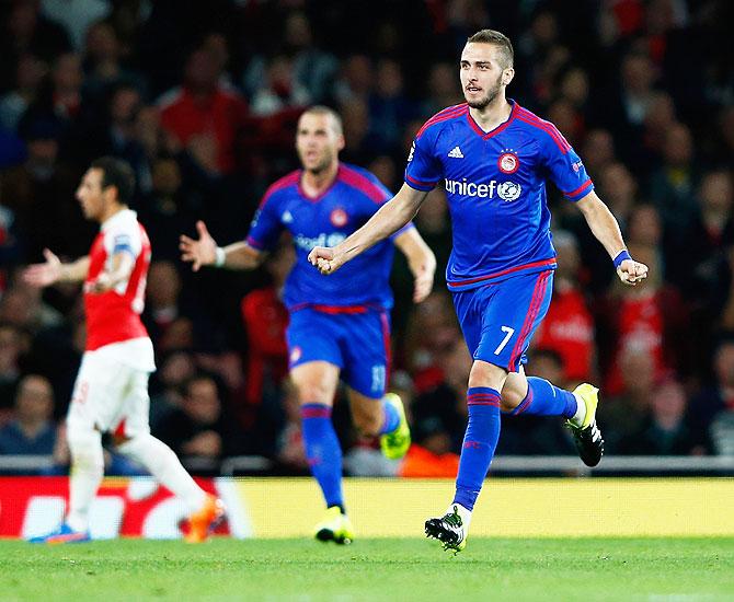 Olympiacos' Kostas Fortounis celebrates a goal