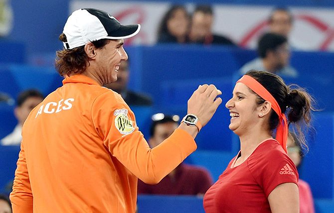 India's Sania Mirza being greeted by her Indian Aces teammate Rafael Nadal at the 2015 International Premier Tennis League (IPTL), in New Delhi