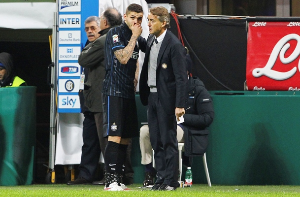 Mauro Emanuel Icardi with Inter coach Roberto Mancini 