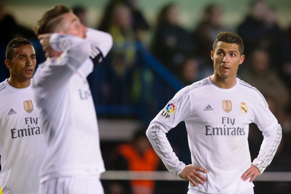 Danilo Luiz da Silva (left) and Cristiano Ronaldo of Real Madrid look dejected 