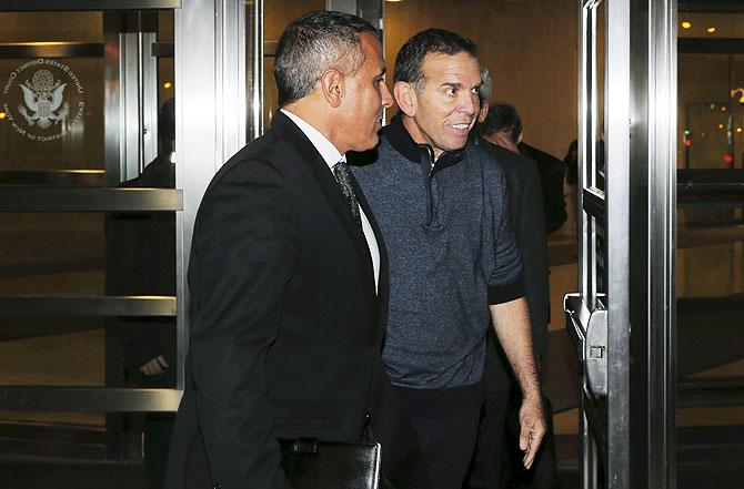 Paraguayan and former president of the South American Football Confederation CONMEBOL Juan Angel Napout (2nd from left), departs the US Federal Court after pleading not guilty in the Brooklyn borough of New York on Tuesday