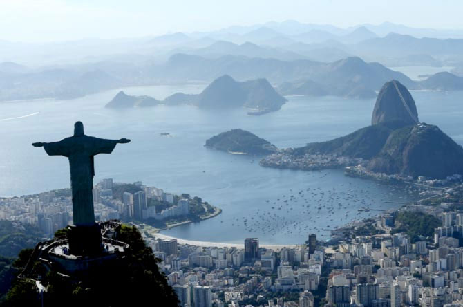 Aerial view of Christ the Redeemer, Flamengo Beach, the Sugar Loaf and Guanabara Bay with one year to go to the Rio 2016 Olympic Games