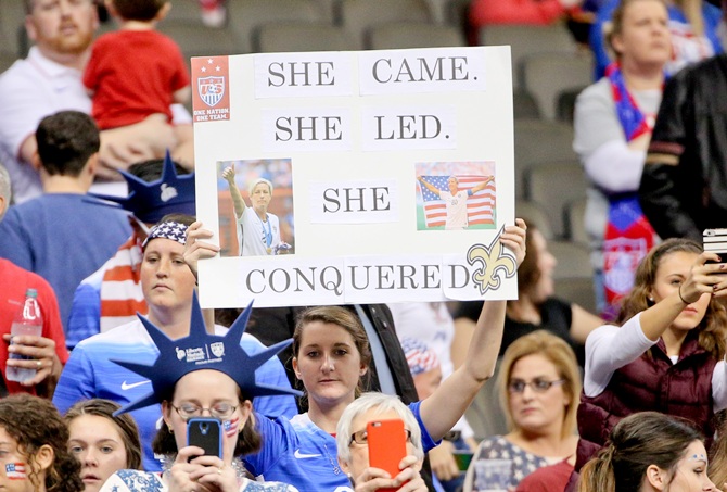  Fans hold up signs for United States of America forward Abby Wambach 
