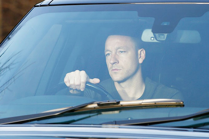 Chelsea's captain John Terry arrives for training the day after manager Jose Mourinho was sacked at the team's training facility in Cobham on Friday