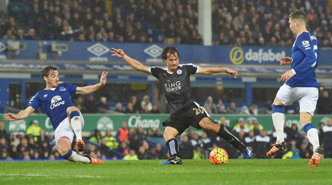 Leicester City's Shinji Okazaki scores his team's third goal against Everton at Goodison Park