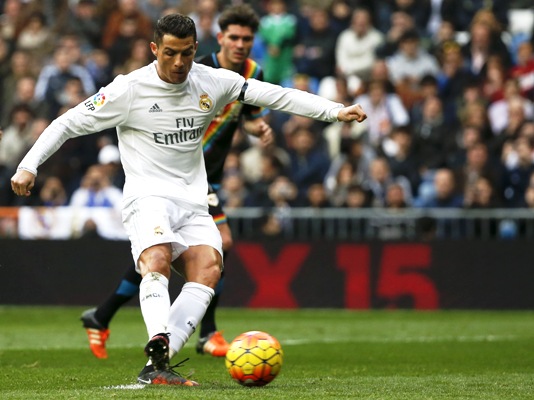 Real Madrid's Cristiano Ronaldo scores his team's third goal 