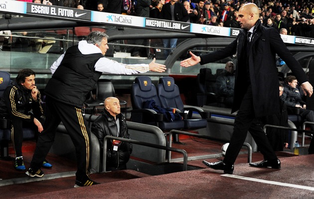 Josep Guardiola (right) greets Jose Mourinho during a Copa del Rey match 