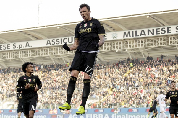 Juventus' Mario Mandzukic celebrates after scoring a second goal 