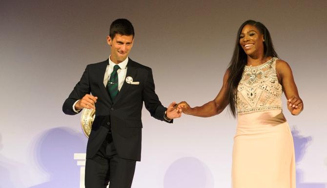 Serena Williams of the United States and Novak Djokovic of Serbia dance 