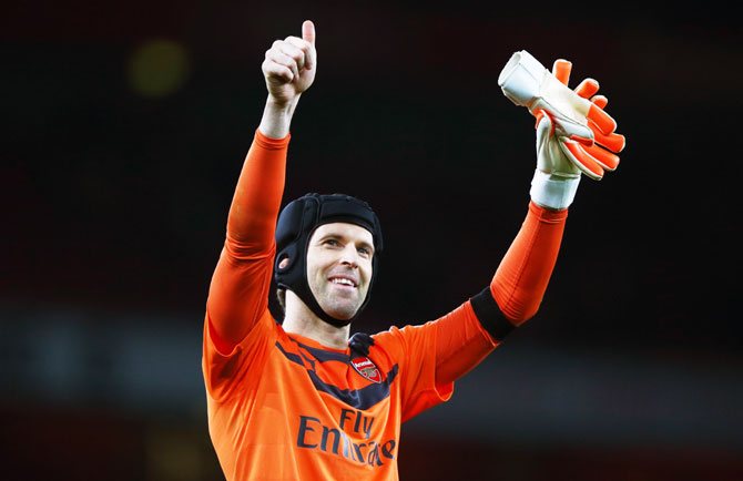 Arsenal 'keeper Petr Cech applauds the fans after his team's 2-0 EPL win over Bournemouth at Emirates Stadium in London on Tuesday