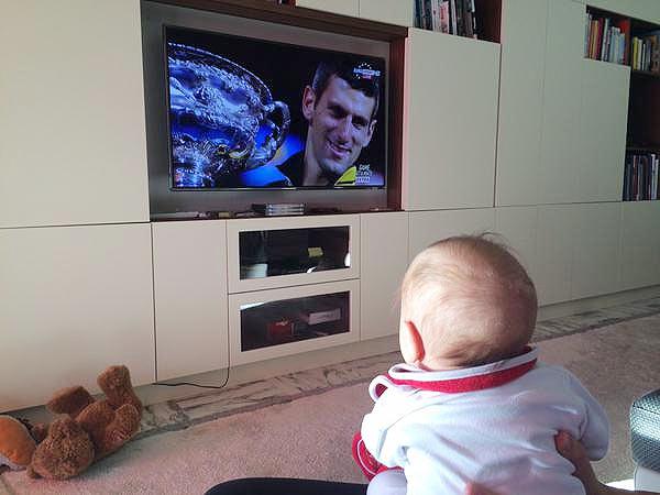 A picture tweeted by Novak Djokovic's wife Jelana, shows their son watching the World No 1 recieve the Australian Open trophy on Sunday