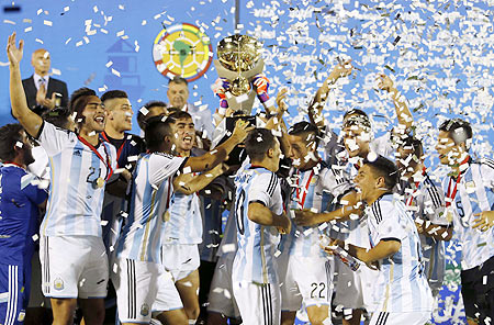 Argentina's players celebrate after winning the South American Under-20 Championship against Uruguay in Montevideo on Saturday