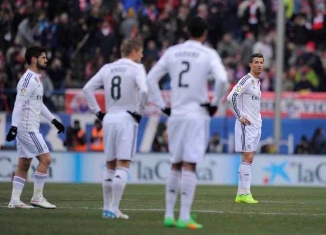 Cristiano Ronaldo of Real Madrid reacts after Atletico Madrid scored their 3rd goal during their La Liga match on Saturday