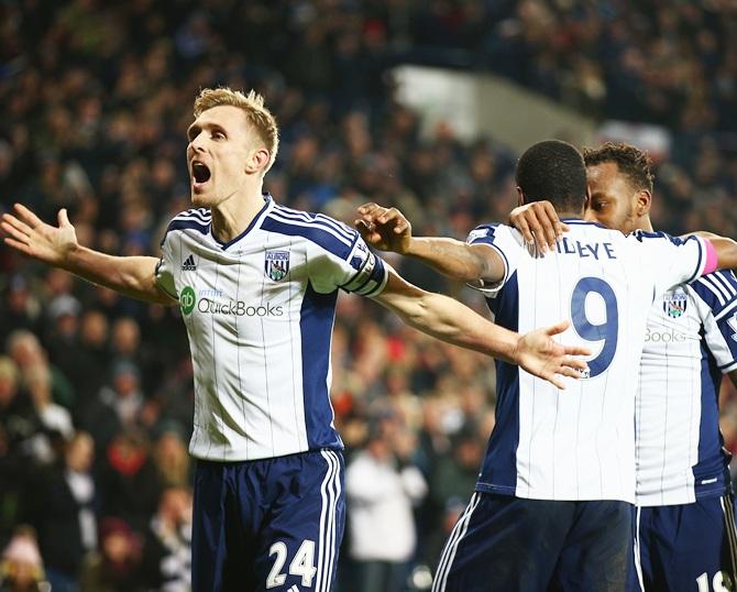 Darren Fletcher of West Brom celebrates the goal scored by Brown Ideye