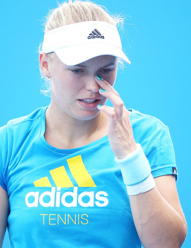 Caroline Wozniacki of Denmark looks on in a practice session