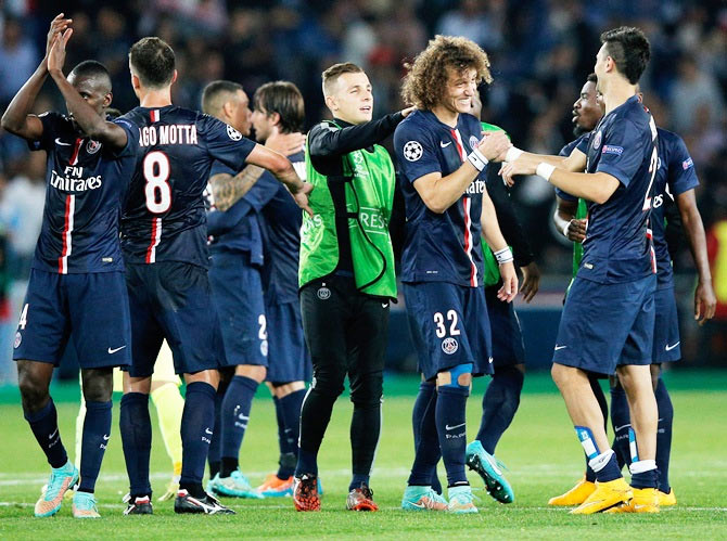 David Luiz and Javier Pastore of PSG celebrate victory