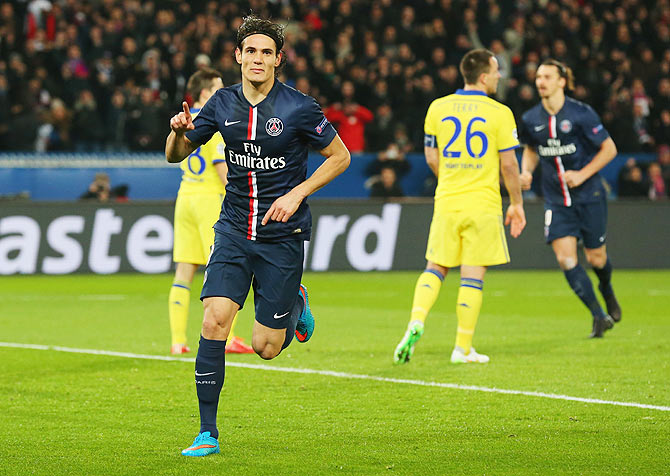  Edinson Cavani of Paris Saint-Germain celebrates as he scores the equalising goal against Chelsea during their UEFA Champions League Round of 16 match at Parc des Princes in Paris on Tuesday