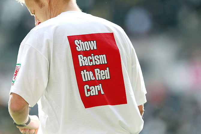 Referee Mike Jones with anti racism t-shirt