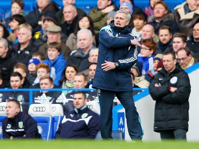 Chelsea manager Jose Mourinho gestures during the English Premier League match against Burnley at Stamford Bridge on Saturday