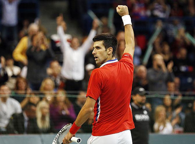 Novak Djokovic of Serbia celebrate a point against Radek Stepanek of Czech Republic during the day one of the final Davis Cup match between Serbia and Czech Republic on November 15, 2013 in Belgrade